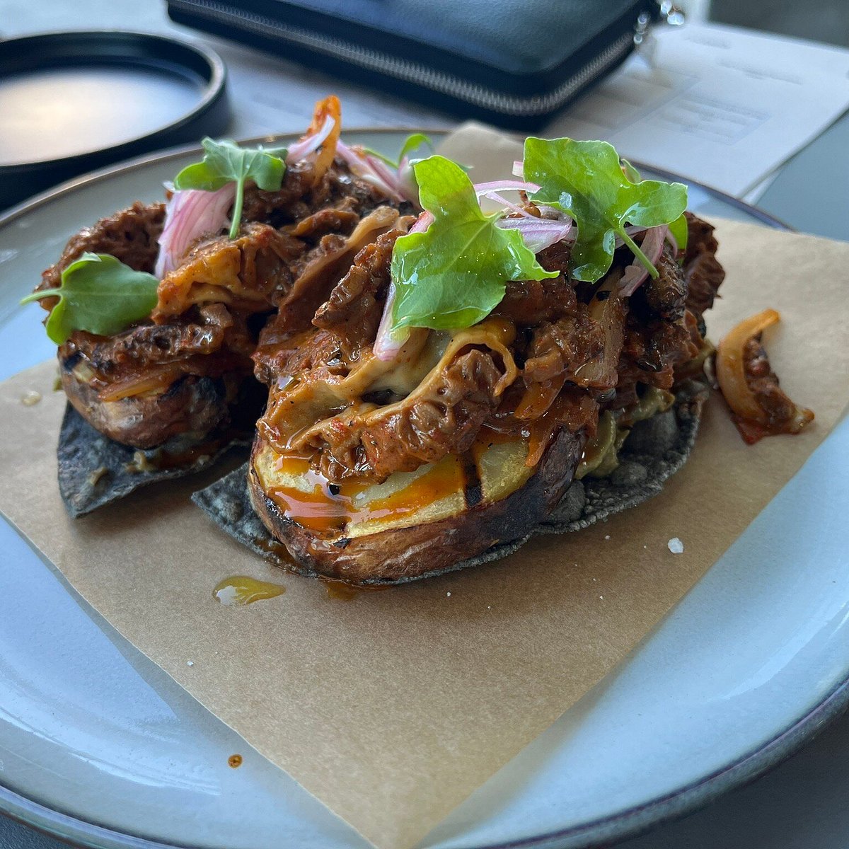 Lilia Comedor signature dishes Pork Collar Confit, Seared Diver Scallop, Pork Collar Carnitas, Mole, Braised Short Rib Emolada